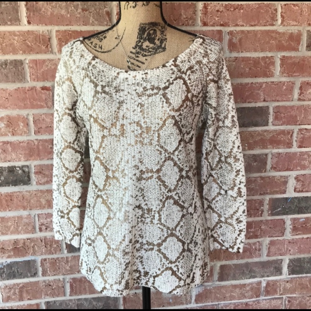 Limited sweater. Cream with antique gold stamping.